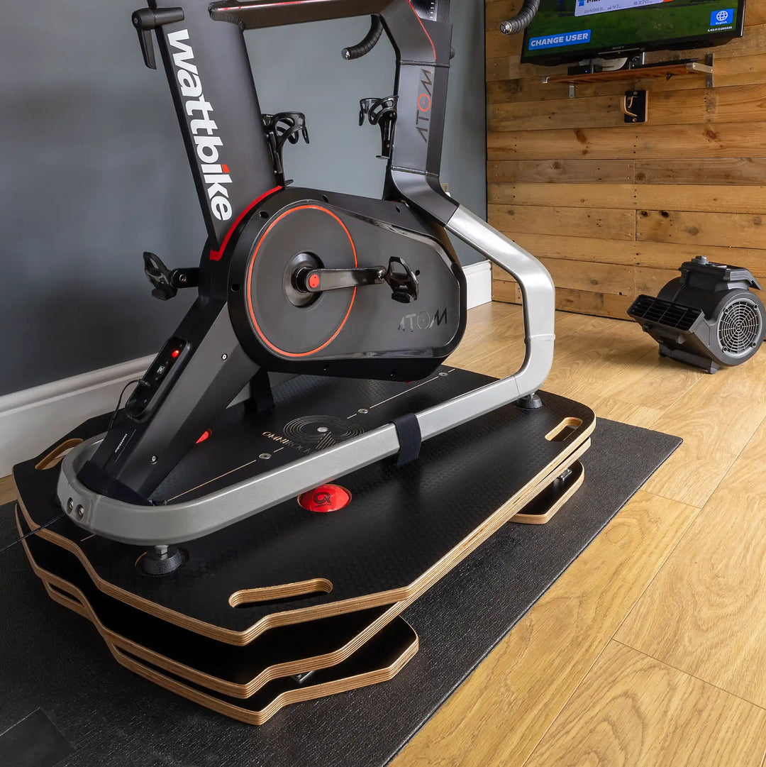 The Omnirocker for the Wattbike Atom setup in a paincave with Zwift.