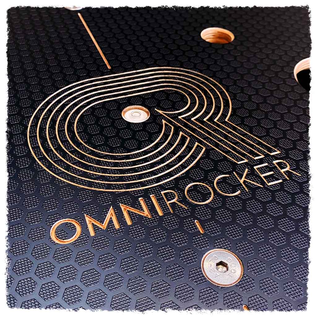 Omnirocker rocker plate for the Wahoo Kickr bike. Logo detail, Stealth finish.