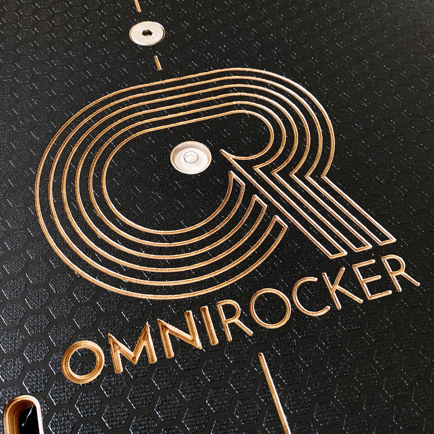Omnirocker Lite rocker plate for Turbo Trainers. Logo detail, Stealth finish.